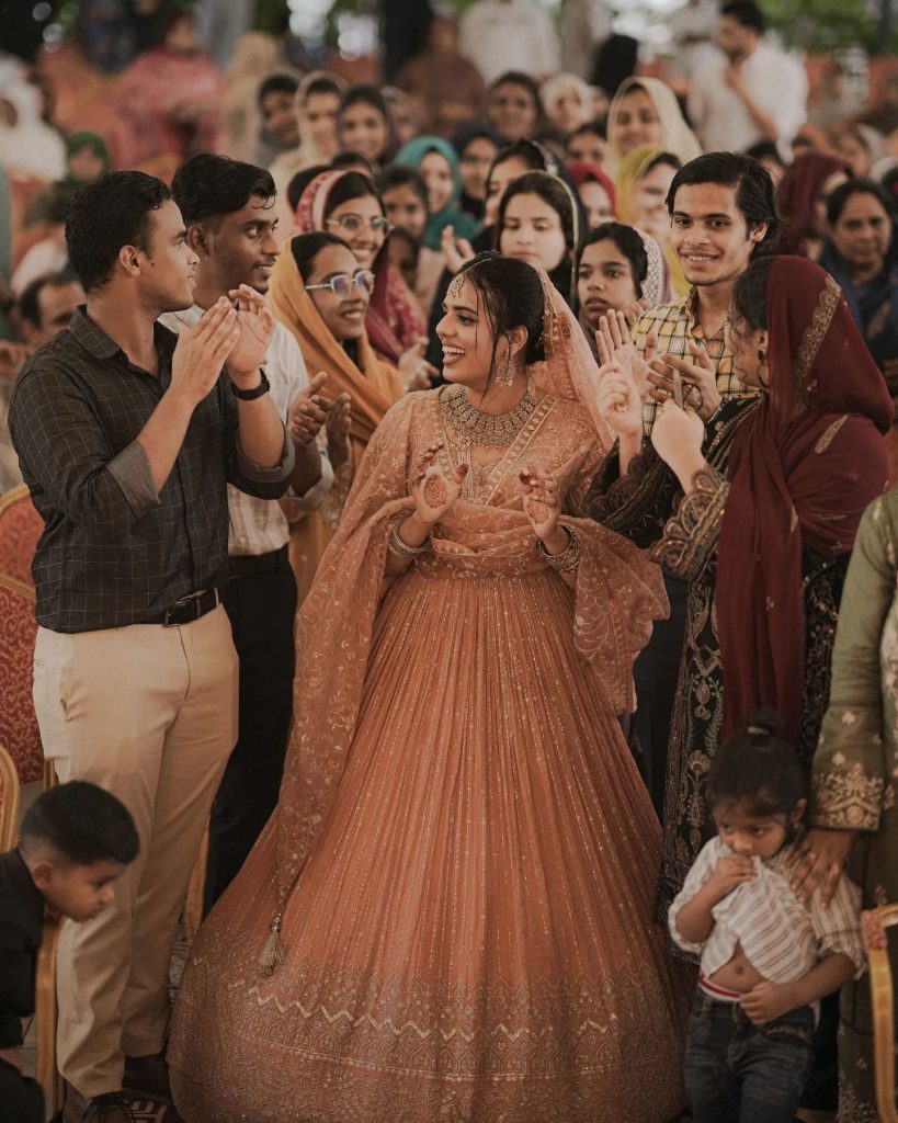 Pre wedding photo shoot in Bangalore in Bangalore taking a candid photo of a bride laughing with her bridesmaids