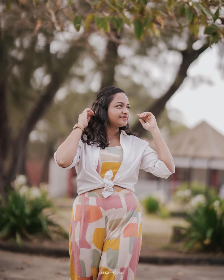 A wedding photographer in Bangalore capturing a moment of bride